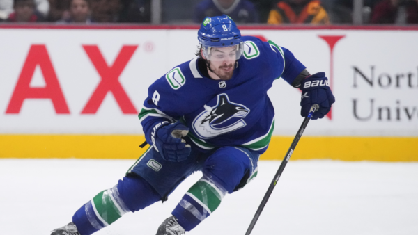 Canucks’ Garland exits game vs. Wild after blocking shot